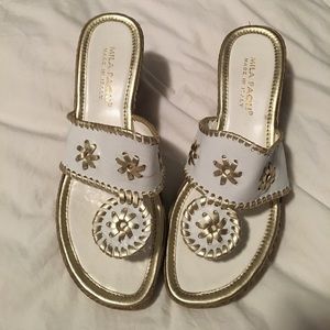 White and gold slip on sandals