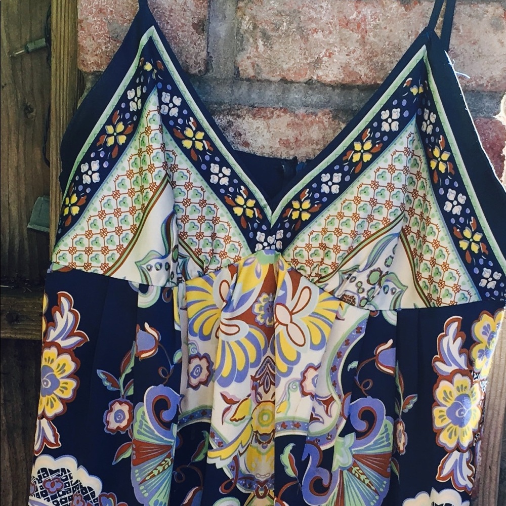 100% silk dress- beautiful colors and pattern.