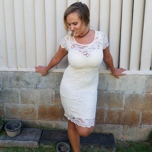 Lace off-white cocktail dress.