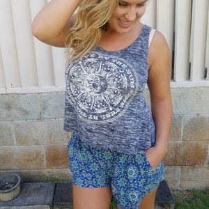 100% rayon blue/teal shorts.