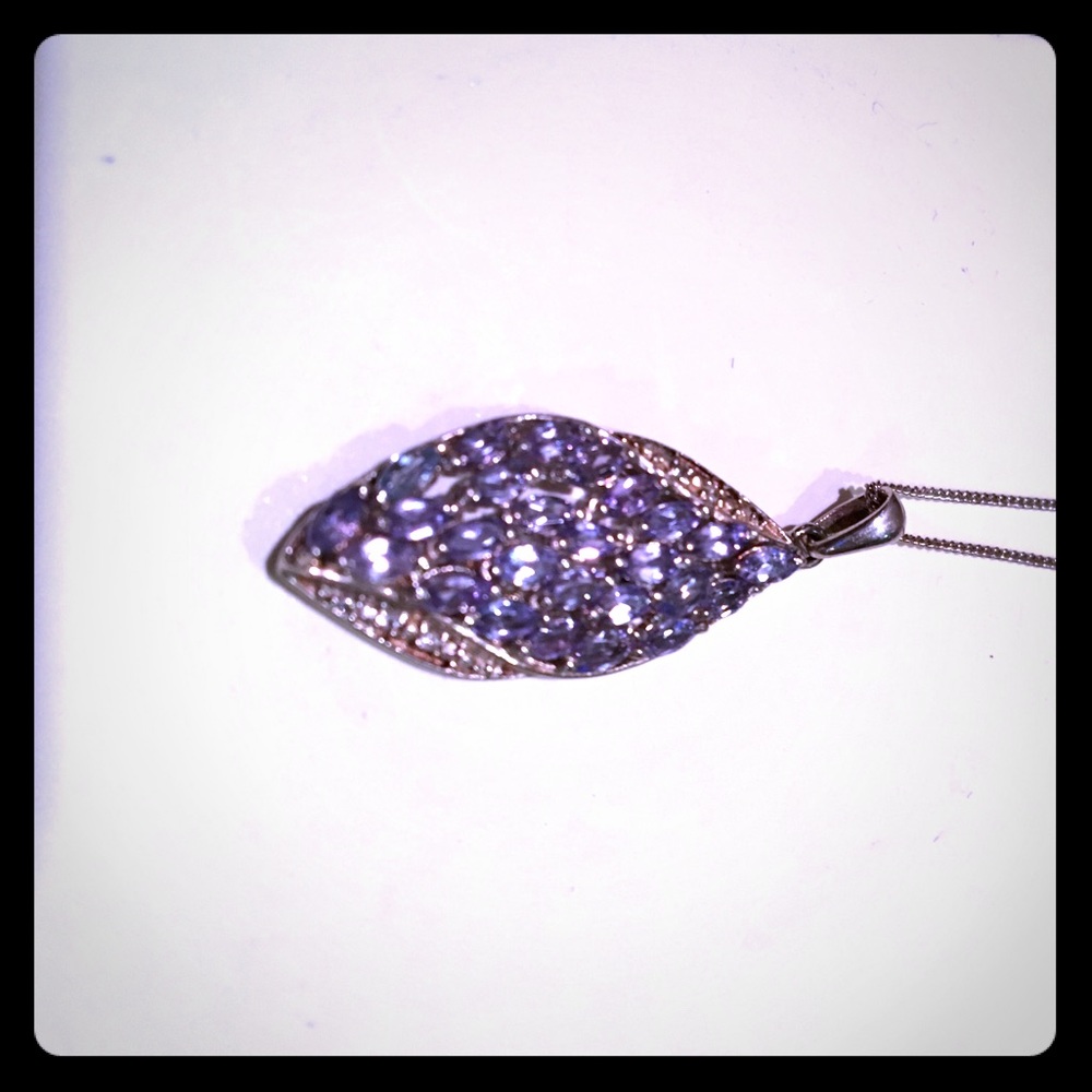 Tanzanite teardrop shaped pendant - topaz accent