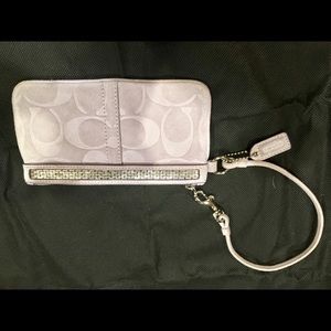 Gently used Wristlet with moon keychain
