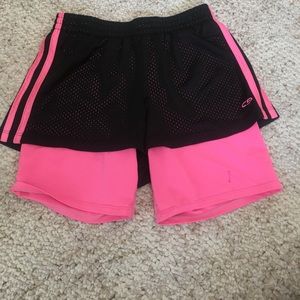 Pink and black athletic shorts