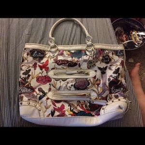 Large leather tote by THE SAK. White nature print.