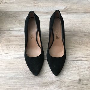 Suede wedge closed toe pump.