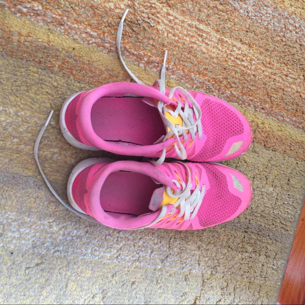 Pink Nike free runs 5.0