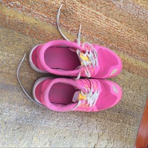 Pink Nike free runs 5.0