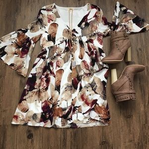 Fall floral dress with eyelet buttons