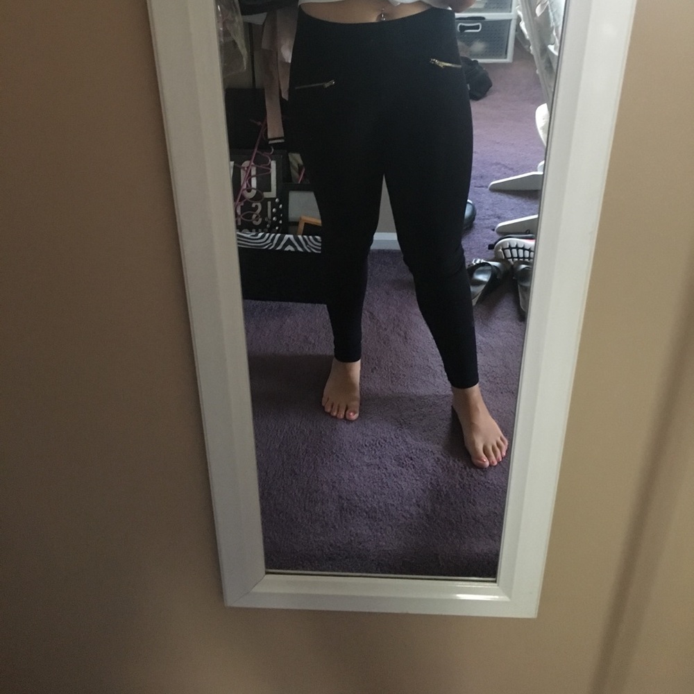 black leggings with gold zippers