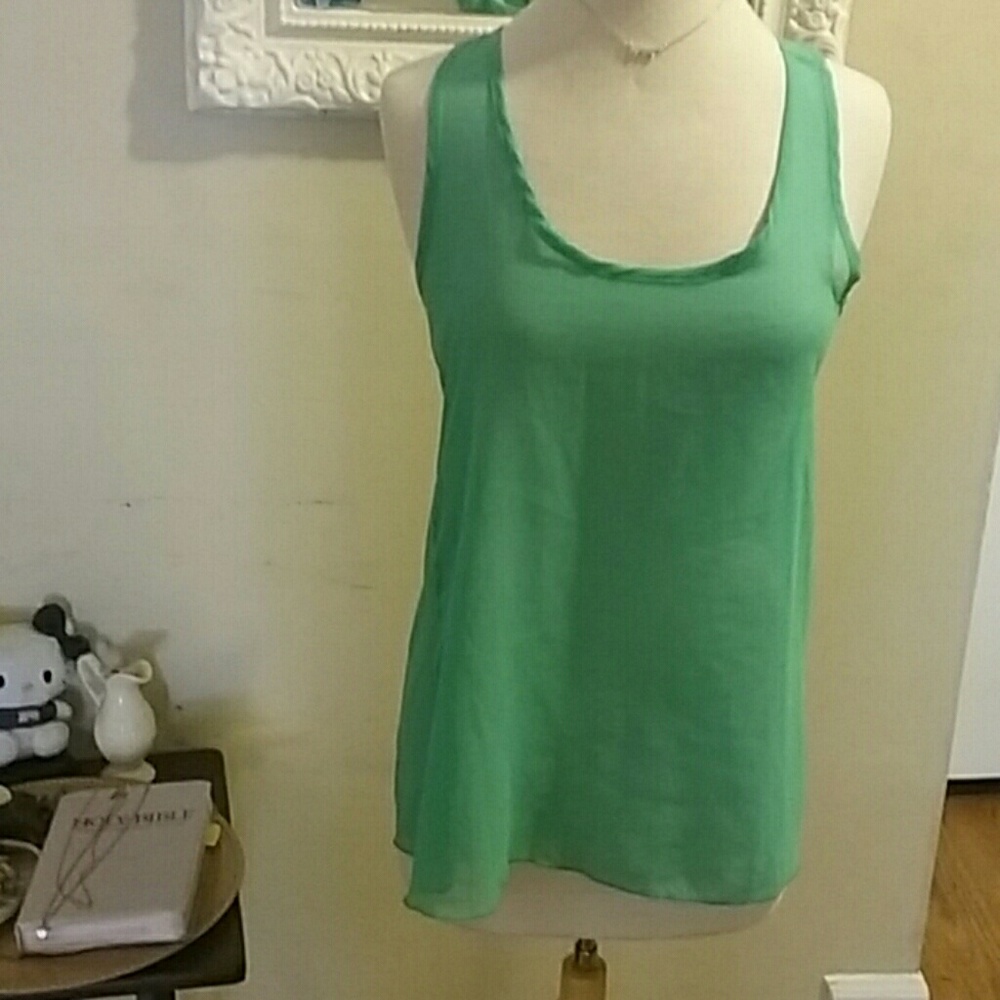 Turquoise boutique top with bow back. Size M