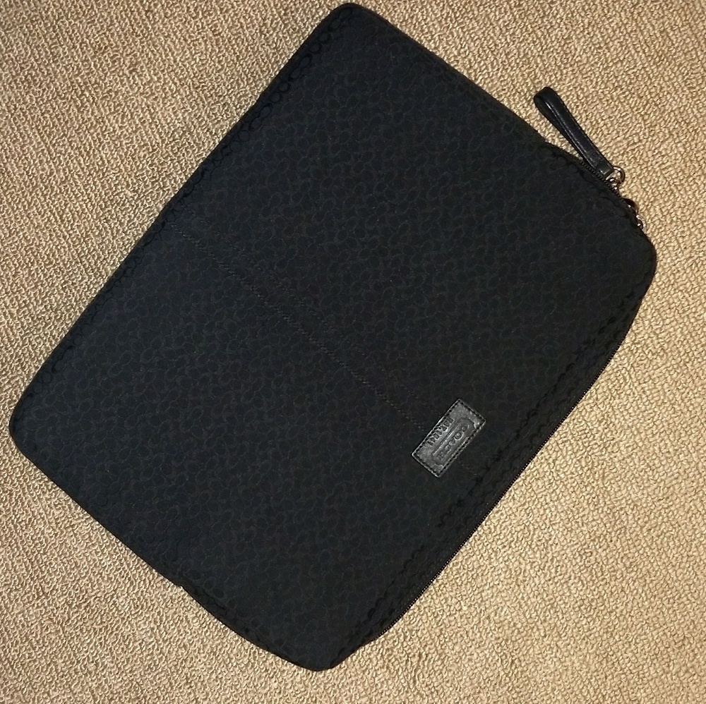 Never used coach laptop sleeve
