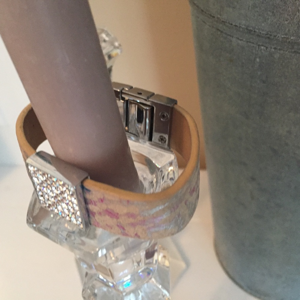 Leather band with embellishment