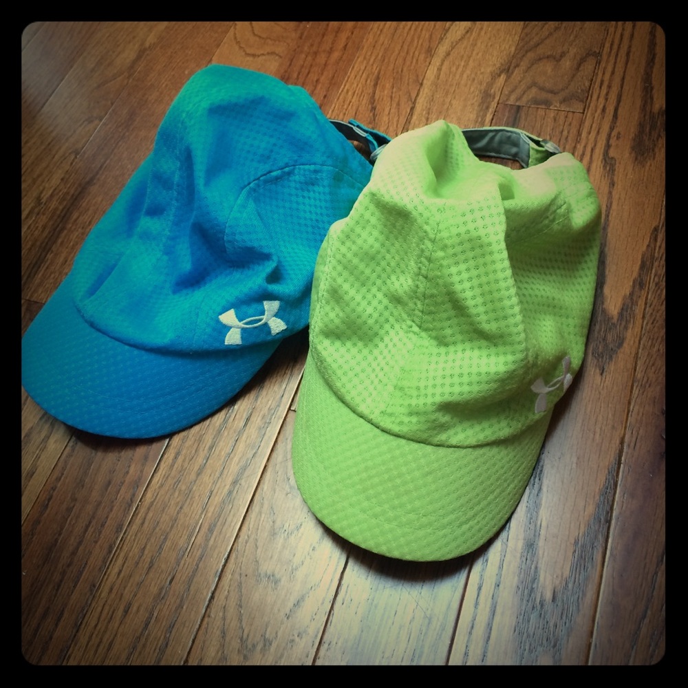 Blue and green under armour sport caps