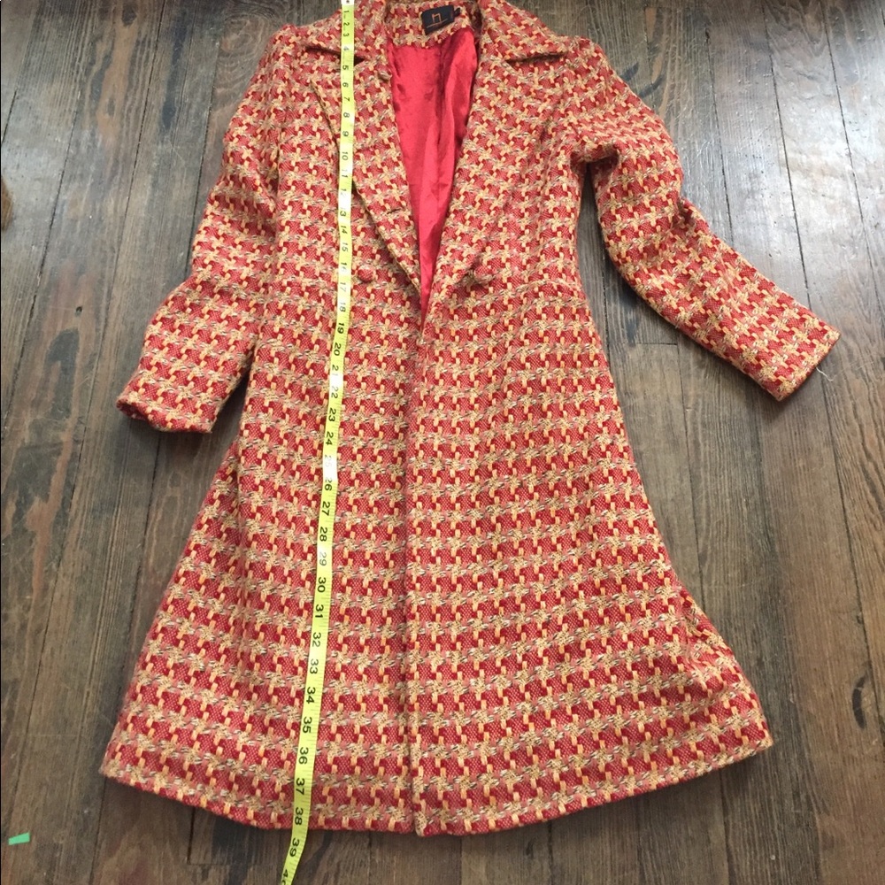 Unique and interesting long peacoat