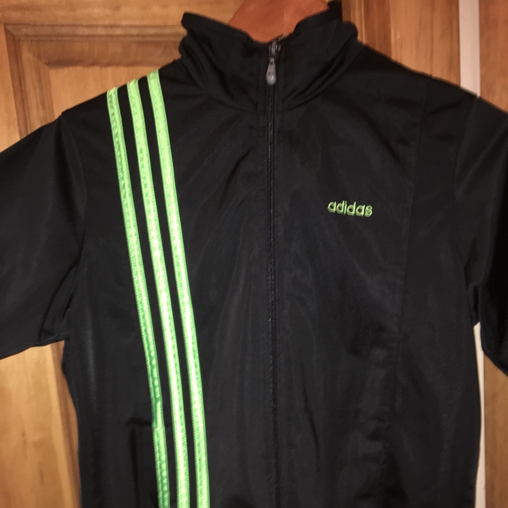 Adidas black zipper jacket with green stripe
