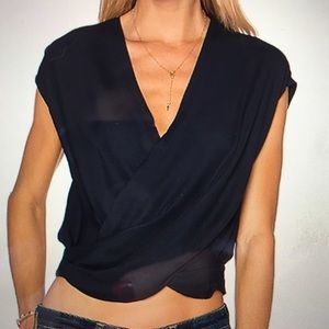 T Lee cross cross cropped blouse