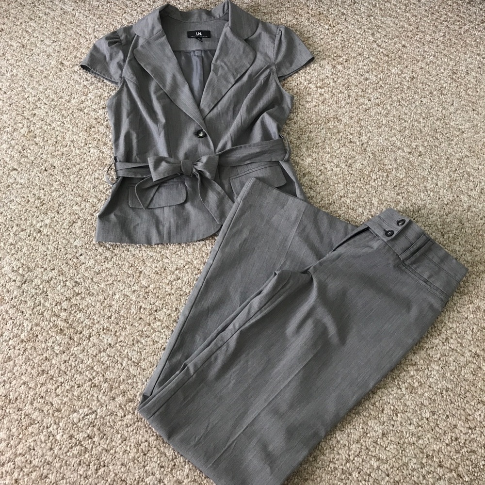 Women's 2 piece charcoal suit, worn only once