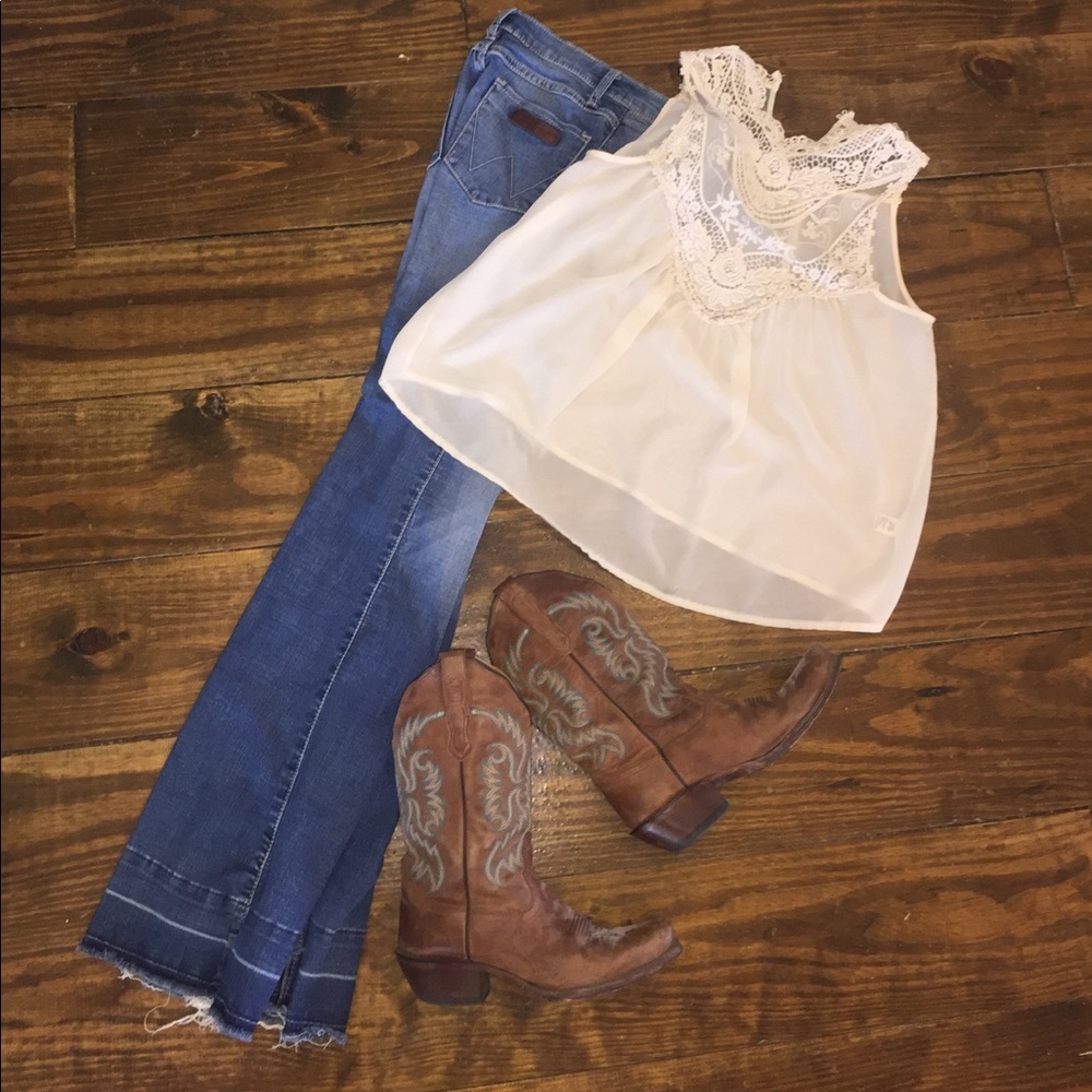 Cream colored sleeveless crocheted top