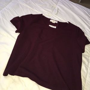 Open back medium length crop top.