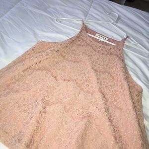 Light pink spaghetti strap top.