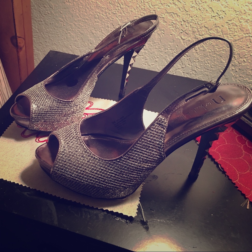 Formal silver heels worn for a wedding