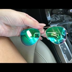 Green mirrored Ray Ban sunglasses
