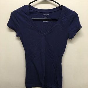 Two solid color v-neck shirts