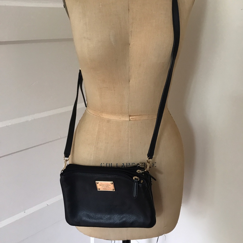 Michael Kors triple zip cross body leather bag
