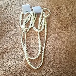 Fake pearl necklaces