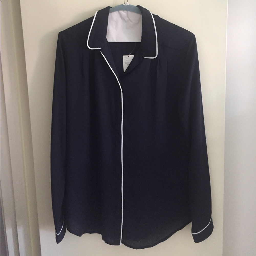 Blue blouse with white piping detail