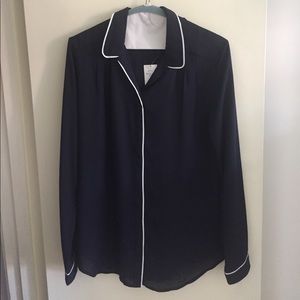 Blue blouse with white piping detail