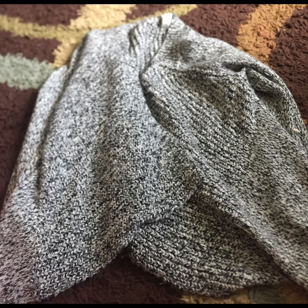 A gray and black and white cardigan