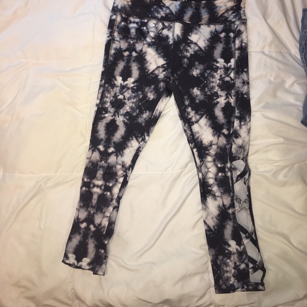 Black/white work out pants with leg cut outs