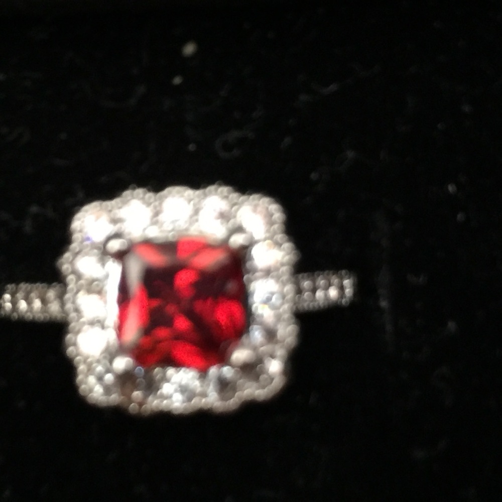 REDUCED-Ruby SS 925 with cz's around Ruby