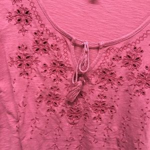 Maroon-pink top with designs