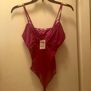 Brand new!! Sheer body suit ! Never worn!!