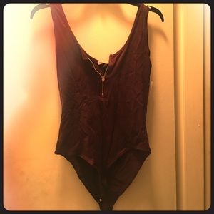 Suede Body suit, brand new! Never worn