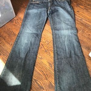 Medium wash. Boot cut. Excellent condition.