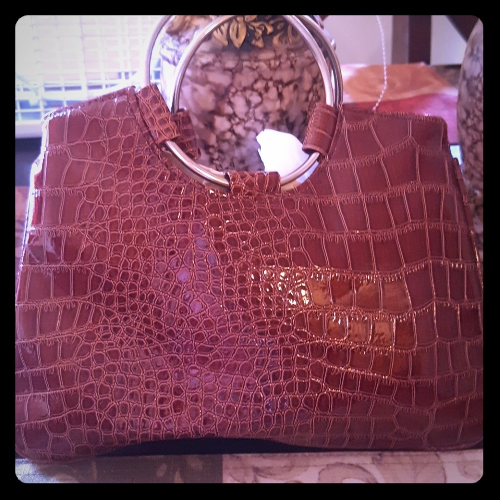 Never used small clutch.