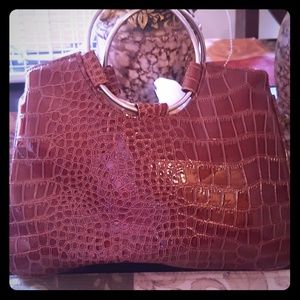 Never used small clutch.