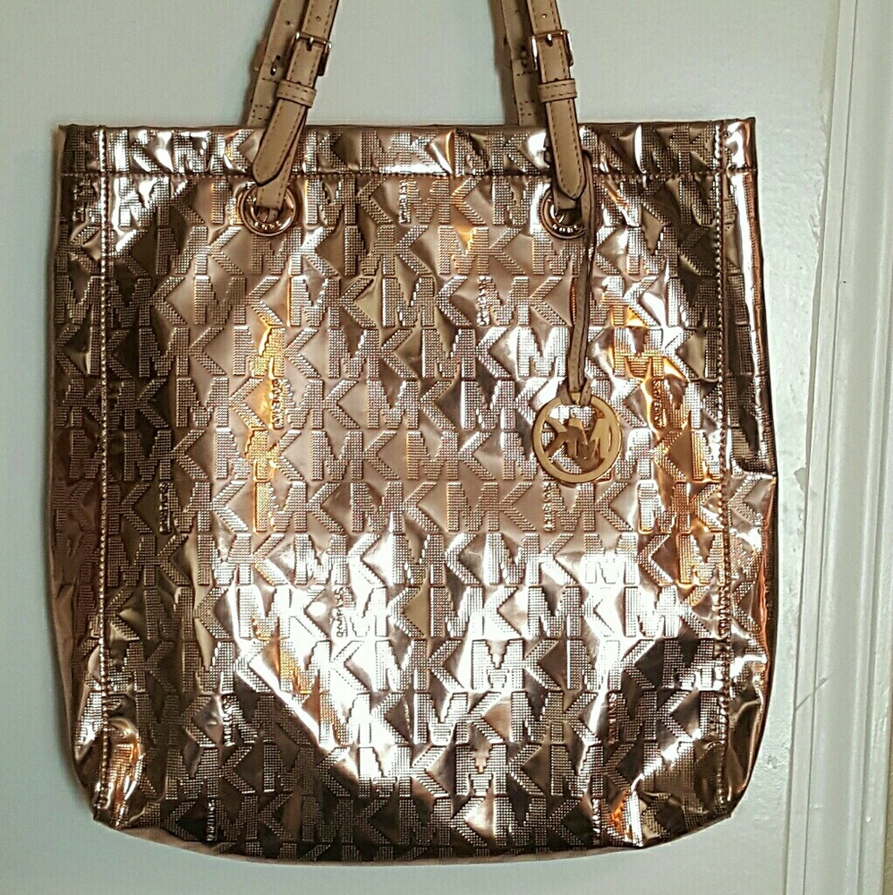 Authentic Micheal Kors rose gold purse