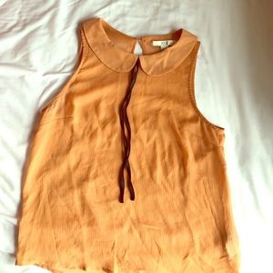 Shear peach sleeveless top
