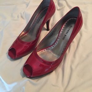 Red high heels barely worn