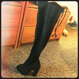Peep toe suede over the knee boot heels.