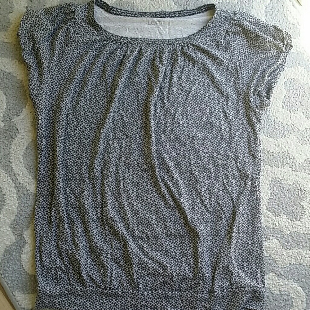 Loft top with lightly puffed sleeves.  Sz L