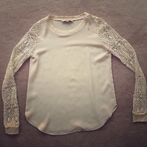 Ann Taylor Loft Blouse with lace cut out sleeves.