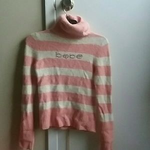 Bebe White and Pink striped rhinestone logo shirt