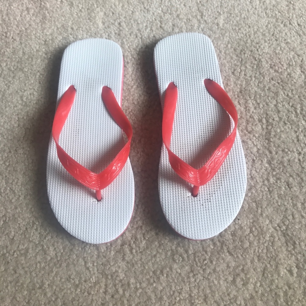 Red and hire flip flops size 6.5