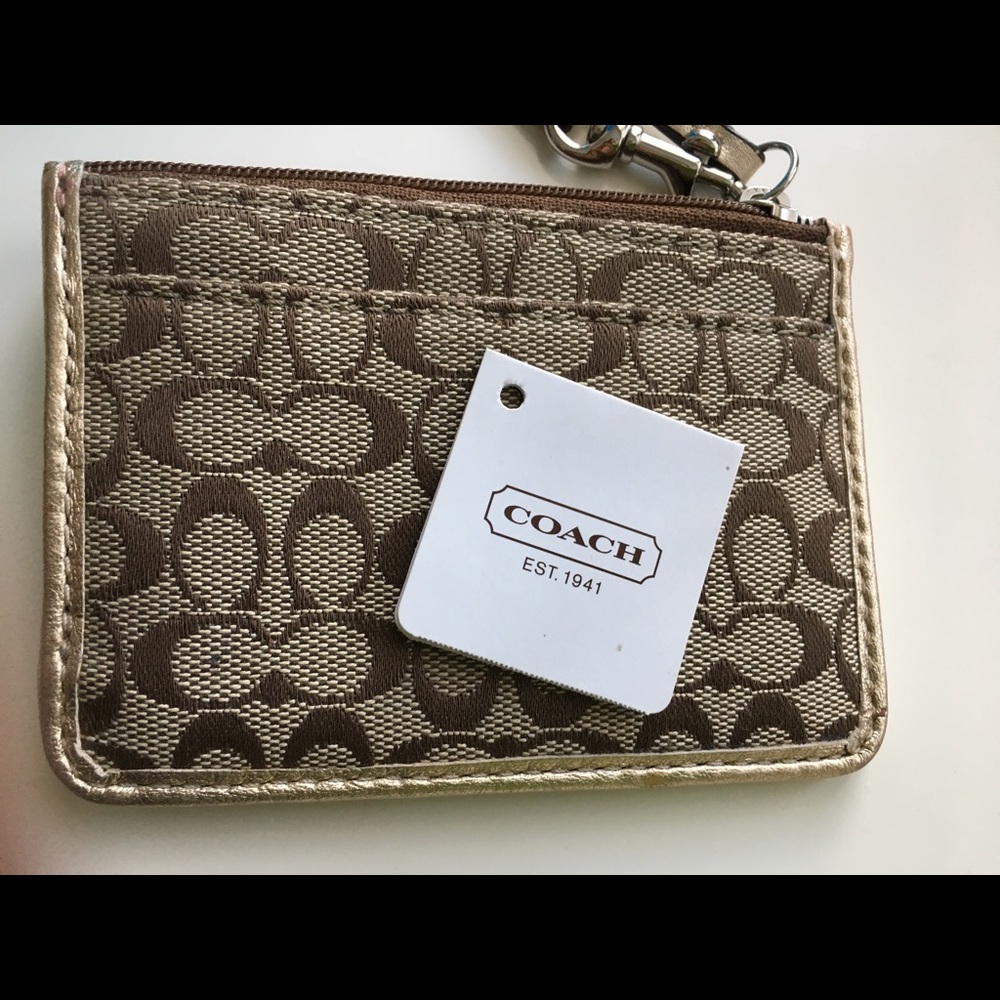 SOLD❗️Coach gold wristlet credit card holder