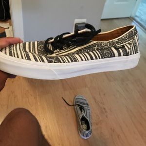 Black and white striped vans